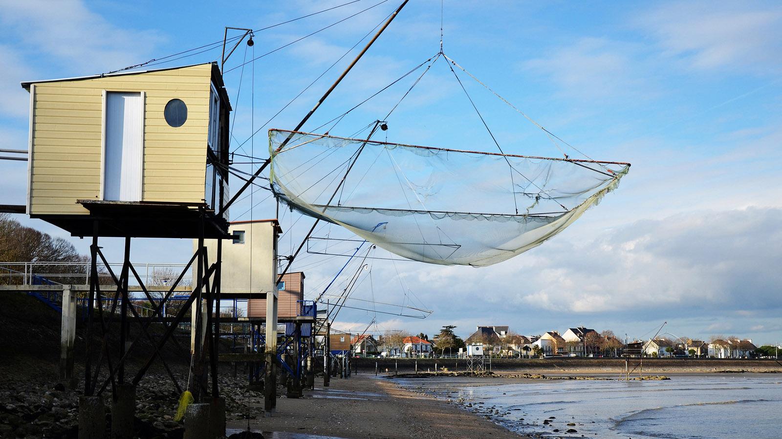 Bei Ebbe kann man unter den Netzen der pêcheries entlanggehen. Foto: Andrea Klose